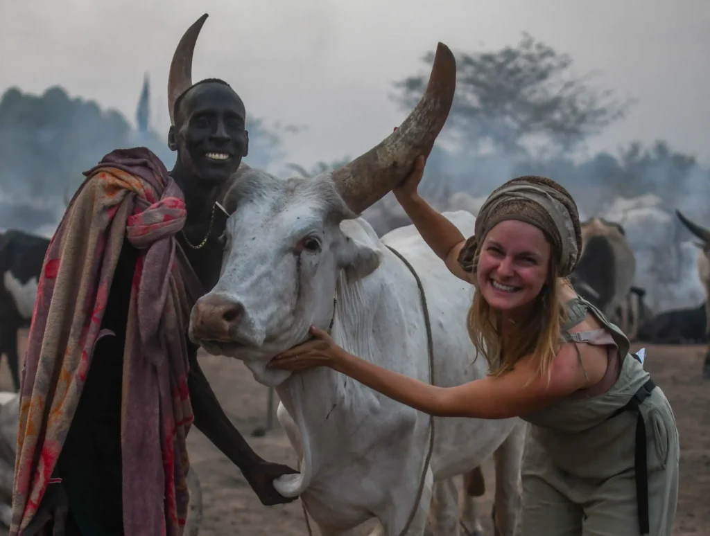 Travel influencer Julianna Jacewicz in South Sudan's Mundari tribe