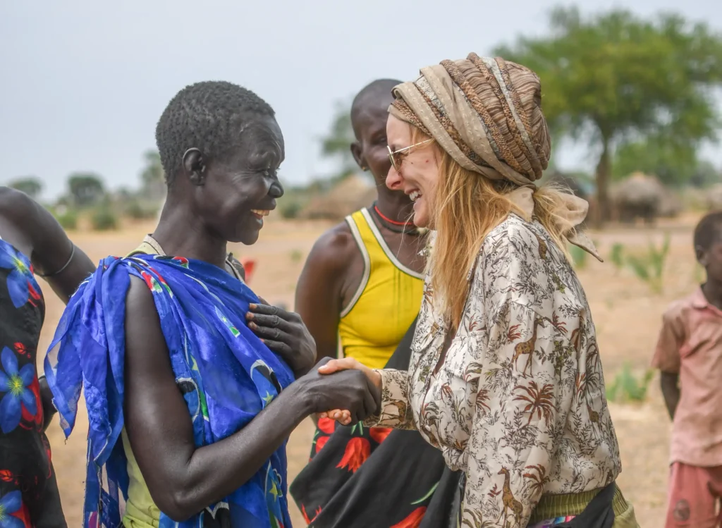 Travel influencer Julianna Jacewicz in South Sudan's Mundari tribe