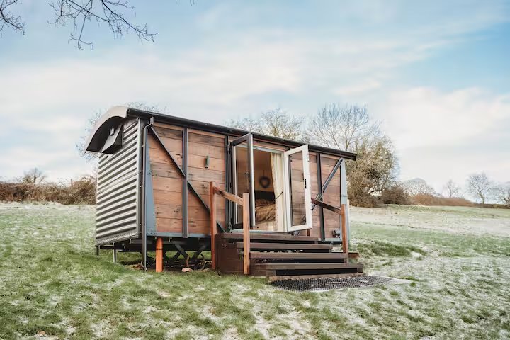 A shepherd's hut Airbnb in Derbyshire sits right next to the field where Clarkson's Farm star Harriet Cowan grazes her cattle