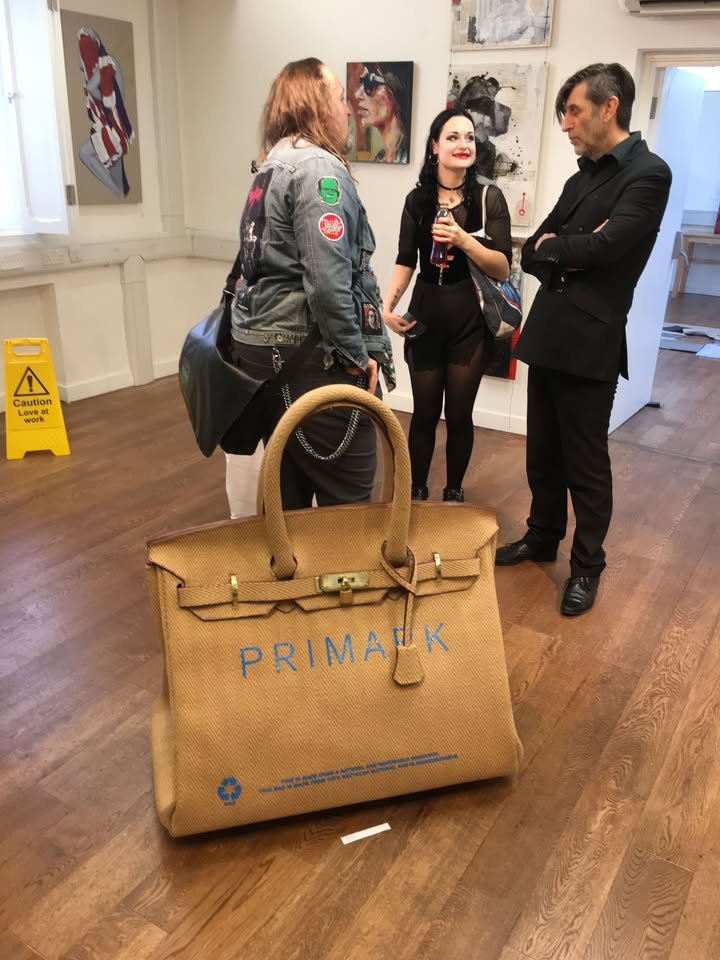Artist Vinay Hathi created an oversized Sainsbury's "Birkin" bag from leftover carpet as a joke