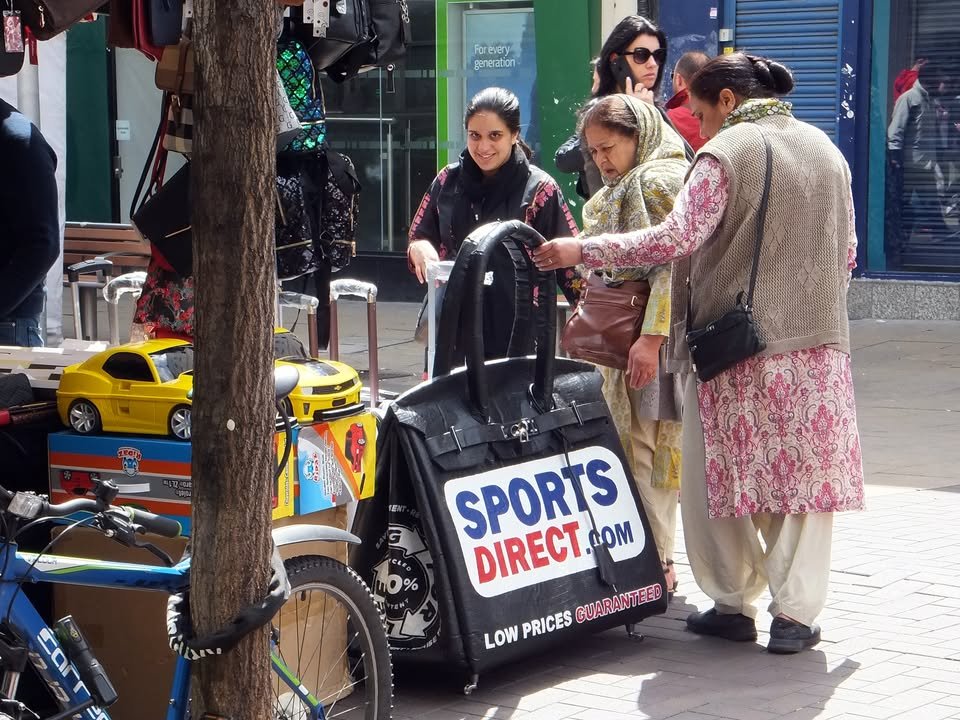Artist Vinay Hathi created an oversized Sainsbury's "Birkin" bag from leftover carpet as a joke