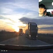 Dashcam footage shows a driver in Kazakhstan threading between two oncoming lorries