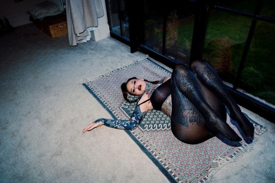 Babestation model Jem Lucy position for a photo