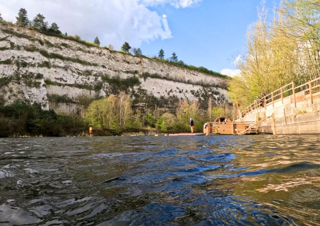 A chalk quarry lake beside Bluewater Shopping Centre in Kent is now hosting nude open-water swims