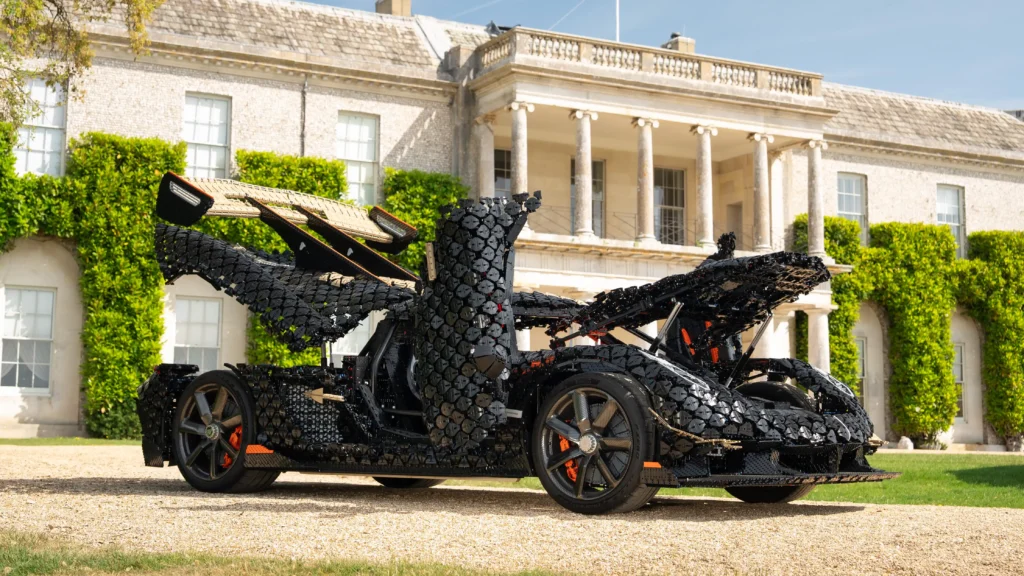 A life-size Lego supercar built from 327,906 bricks has hit a record 69mph at Goodwood