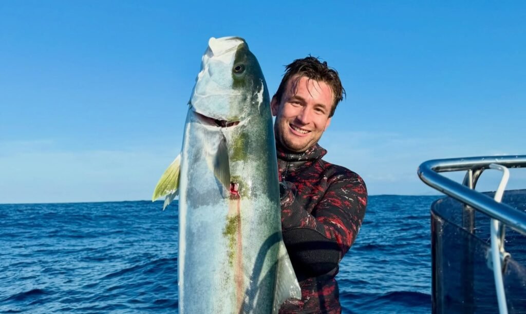Fishing creator Henry Gibbs needed four surgeries and a skin graft after a grey reef shark attack in Fiji