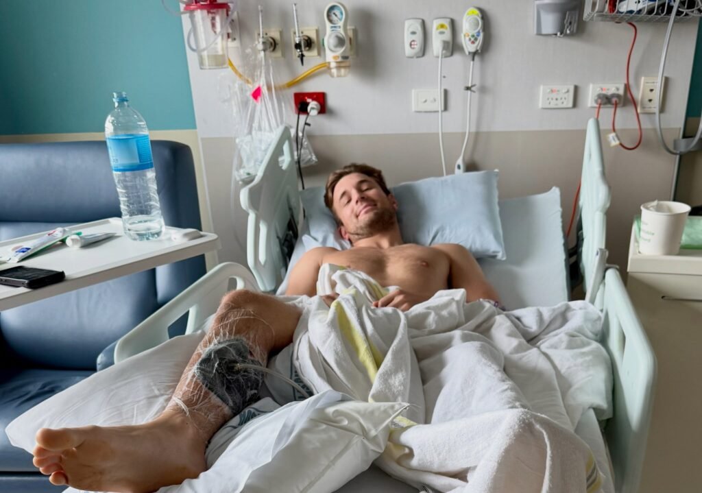 Fishing creator Henry Gibbs needed four surgeries and a skin graft after a grey reef shark attack in Fiji
