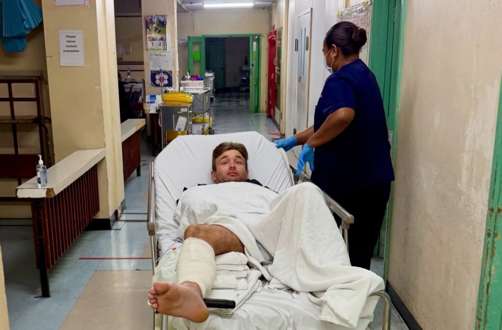 Fishing creator Henry Gibbs needed four surgeries and a skin graft after a grey reef shark attack in Fiji