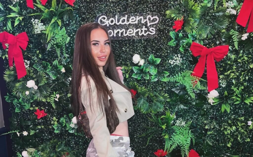 Adult creator Mckenzie posing for a photo