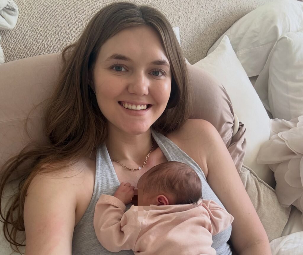 Angela Holm's five-month-old got restless at the gym, so the mum-of-five strapped her on and kept walking