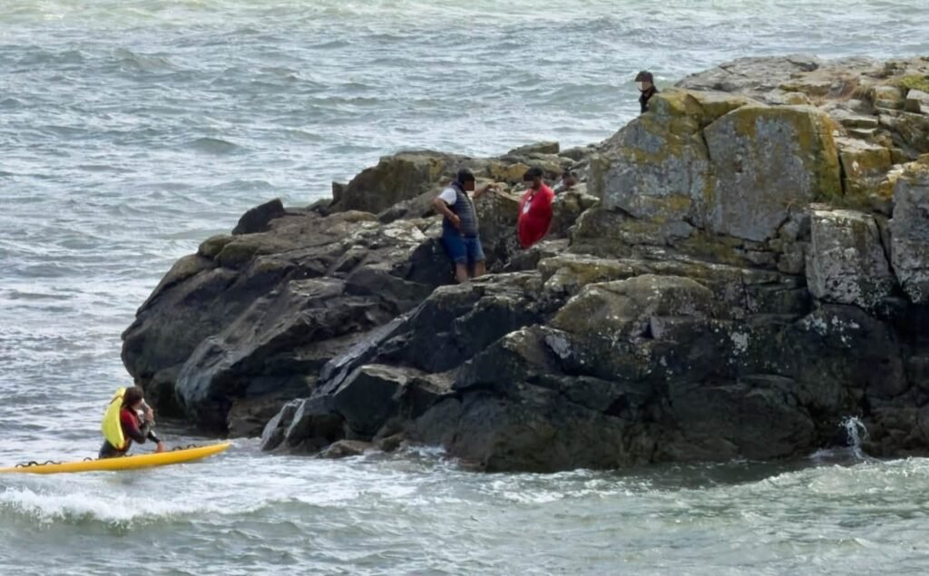 Five people stayed on Chapel Rock in Marazion as the Bank Holiday tide came in