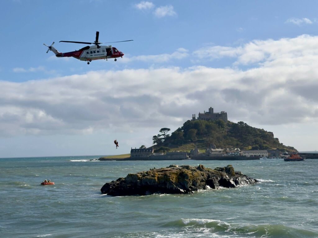 Five people stayed on Chapel Rock in Marazion as the Bank Holiday tide came in
