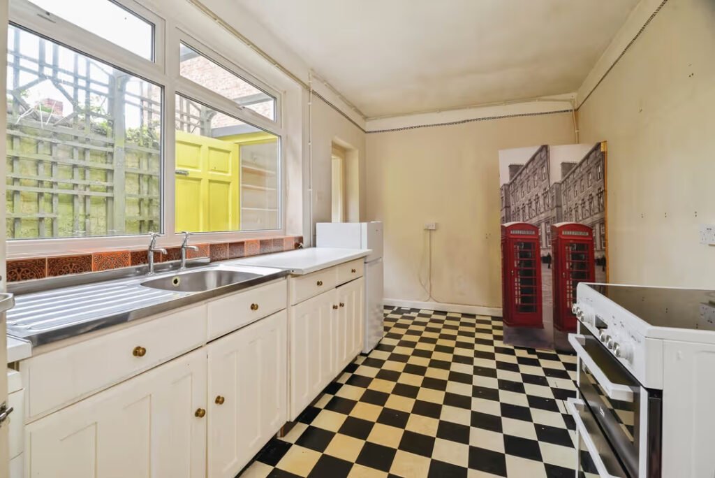 A three-bed terrace in Middlesbrough is on the market for £110,000 with a toilet in the kitchen