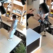 CCTV from a Saratov tech shop shows a customer push humanoid robot Syoma