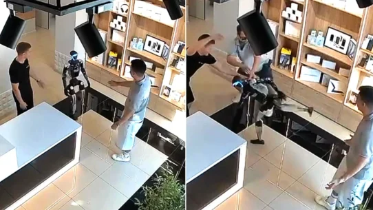 CCTV from a Saratov tech shop shows a customer push humanoid robot Syoma