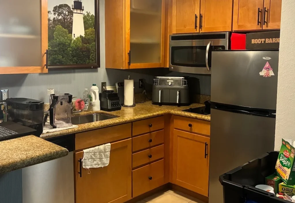 Lilli Holland has lived in hotels since June 2025 with her husband and two dogs. Free breakfast, weekly housekeeping, a pool, with someone else footing the bill.