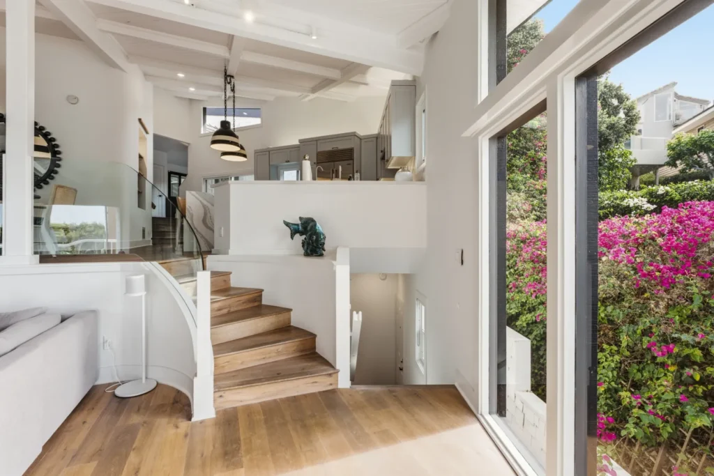 Diane Keaton’s final renovation, a black-and-white Laguna Beach home perched above Table Rock Beach, is on the market for $10.3m. See inside her ocean retreat.