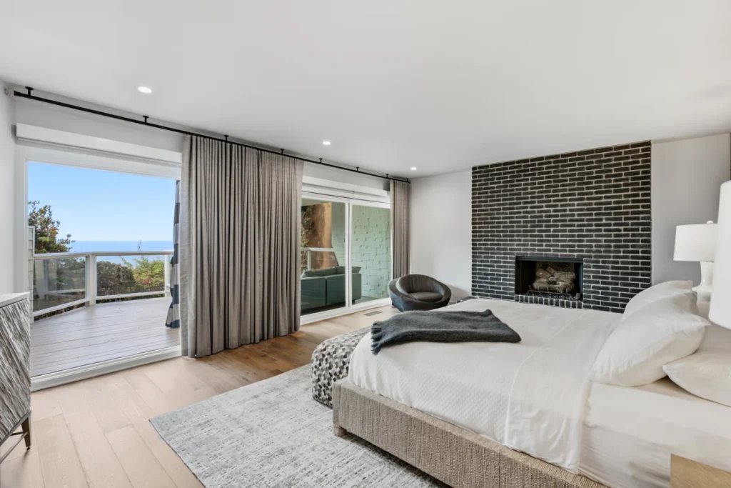 Diane Keaton’s final renovation, a black-and-white Laguna Beach home perched above Table Rock Beach, is on the market for $10.3m. See inside her ocean retreat.