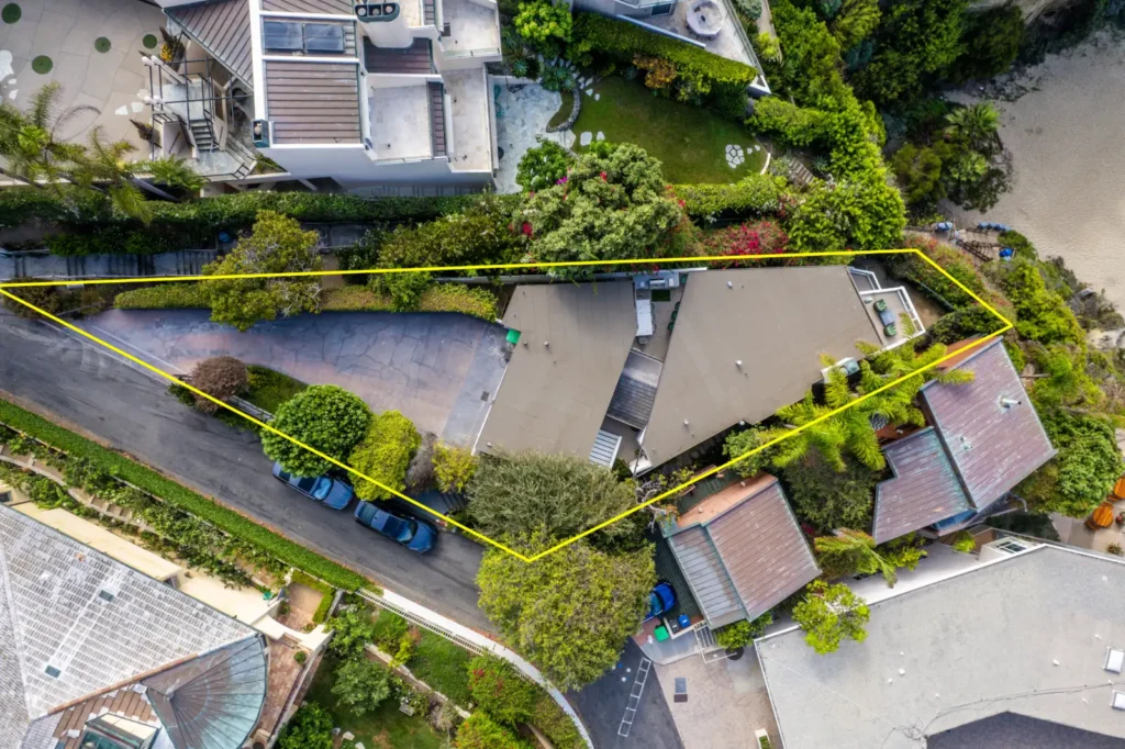 Diane Keaton’s final renovation, a black-and-white Laguna Beach home perched above Table Rock Beach, is on the market for $10.3m. See inside her ocean retreat.