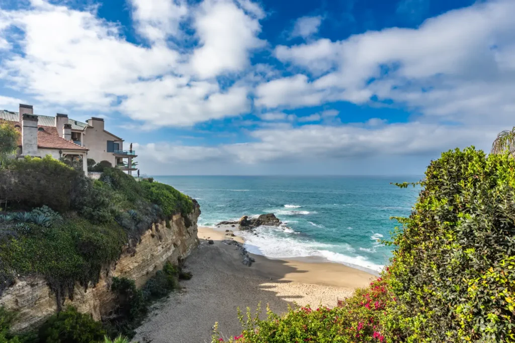 Diane Keaton’s final renovation, a black-and-white Laguna Beach home perched above Table Rock Beach, is on the market for $10.3m. See inside her ocean retreat.