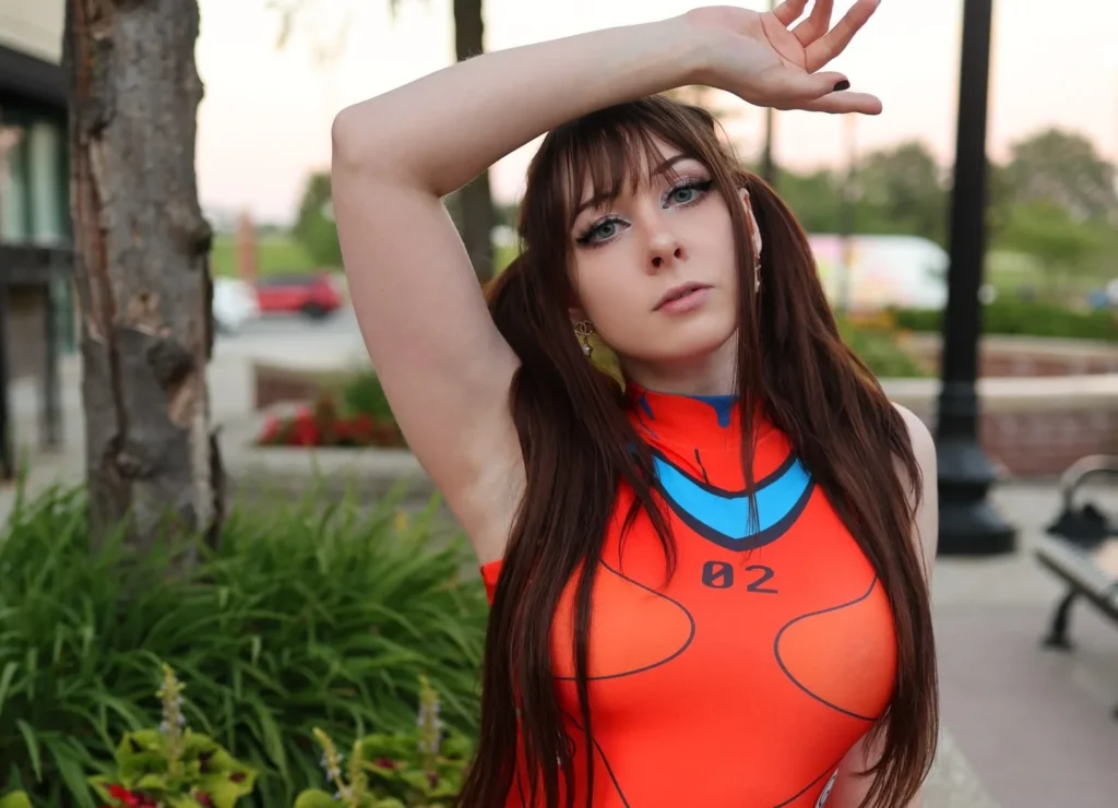 Woman in red Spider-Man costume outdoors