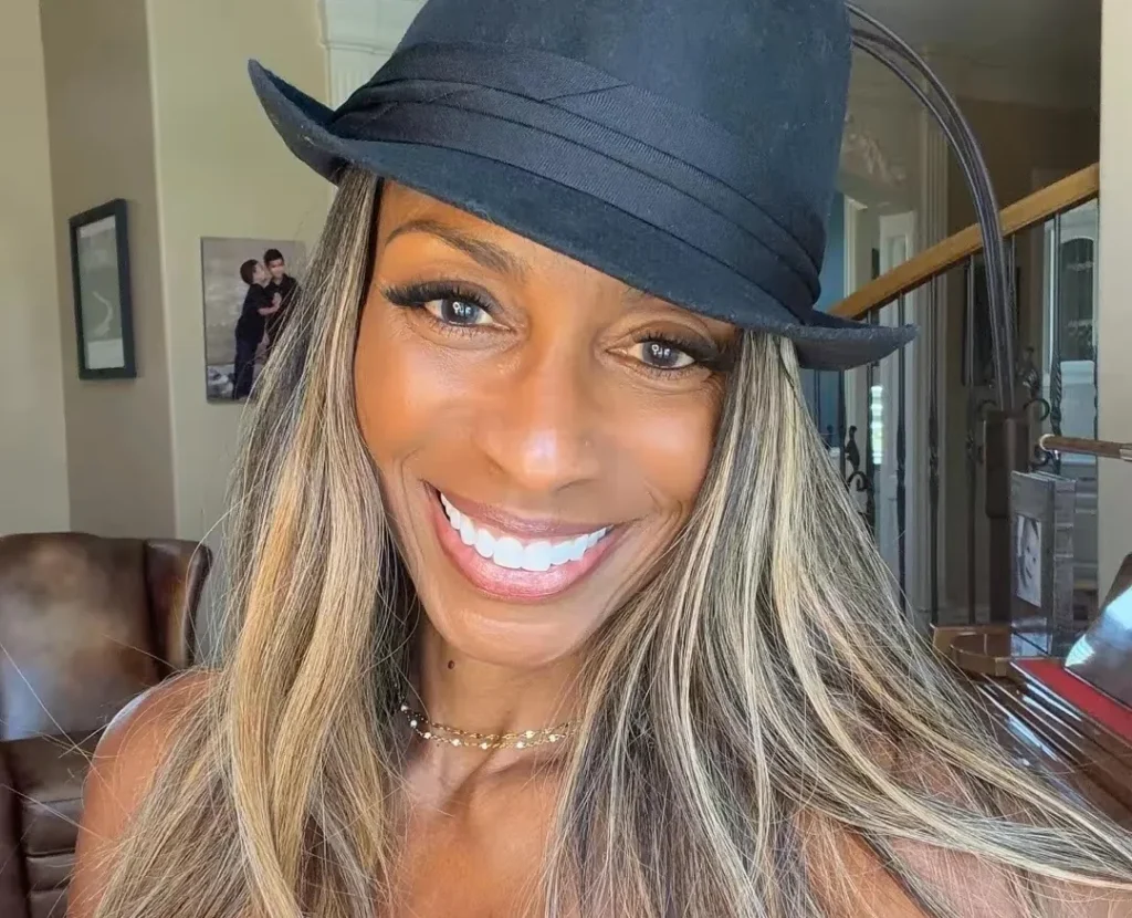 A 61-year-old woman reveals she's fitter than ever and often mistaken for half her age - her husband embraces the attention she gets from younger men.