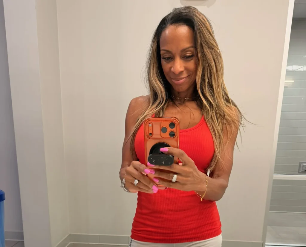 A 61-year-old woman reveals she's fitter than ever and often mistaken for half her age - her husband embraces the attention she gets from younger men.